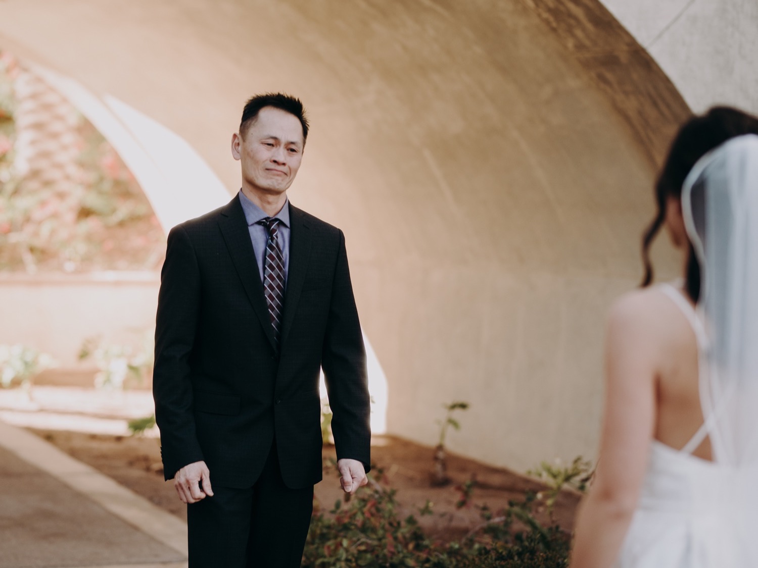 Emotional first look photos of bride and her father. Wedding at reflection bay golf club in henderson nevada. 