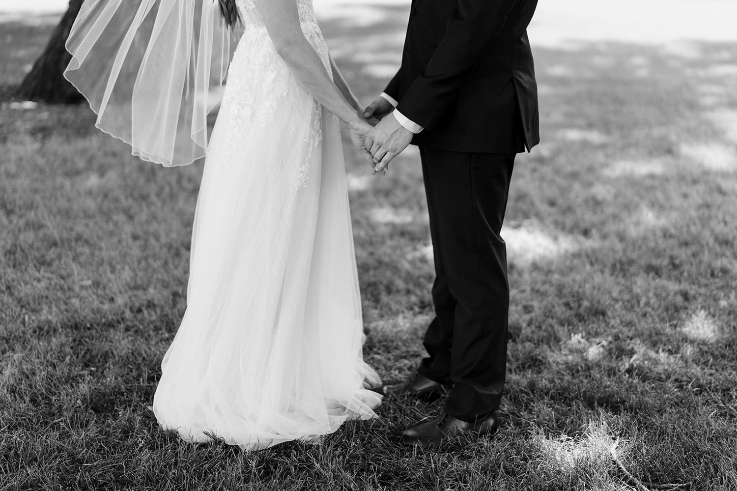 First look photo at Mayowood Stone Barn wedding. Minnesota wedding photographer.