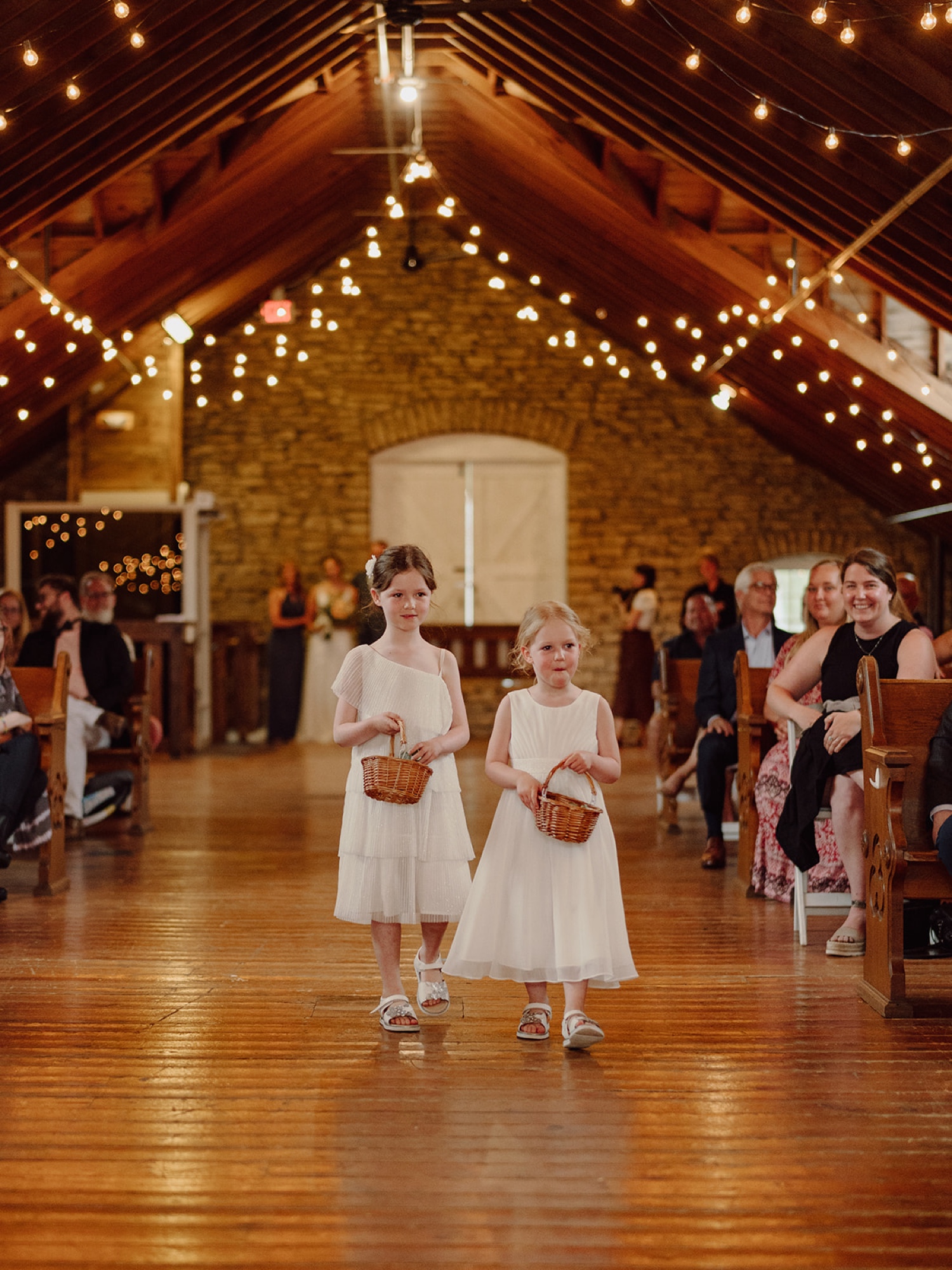 Mayowood Stone Barn wedding photos of ceremony in the barn loft.