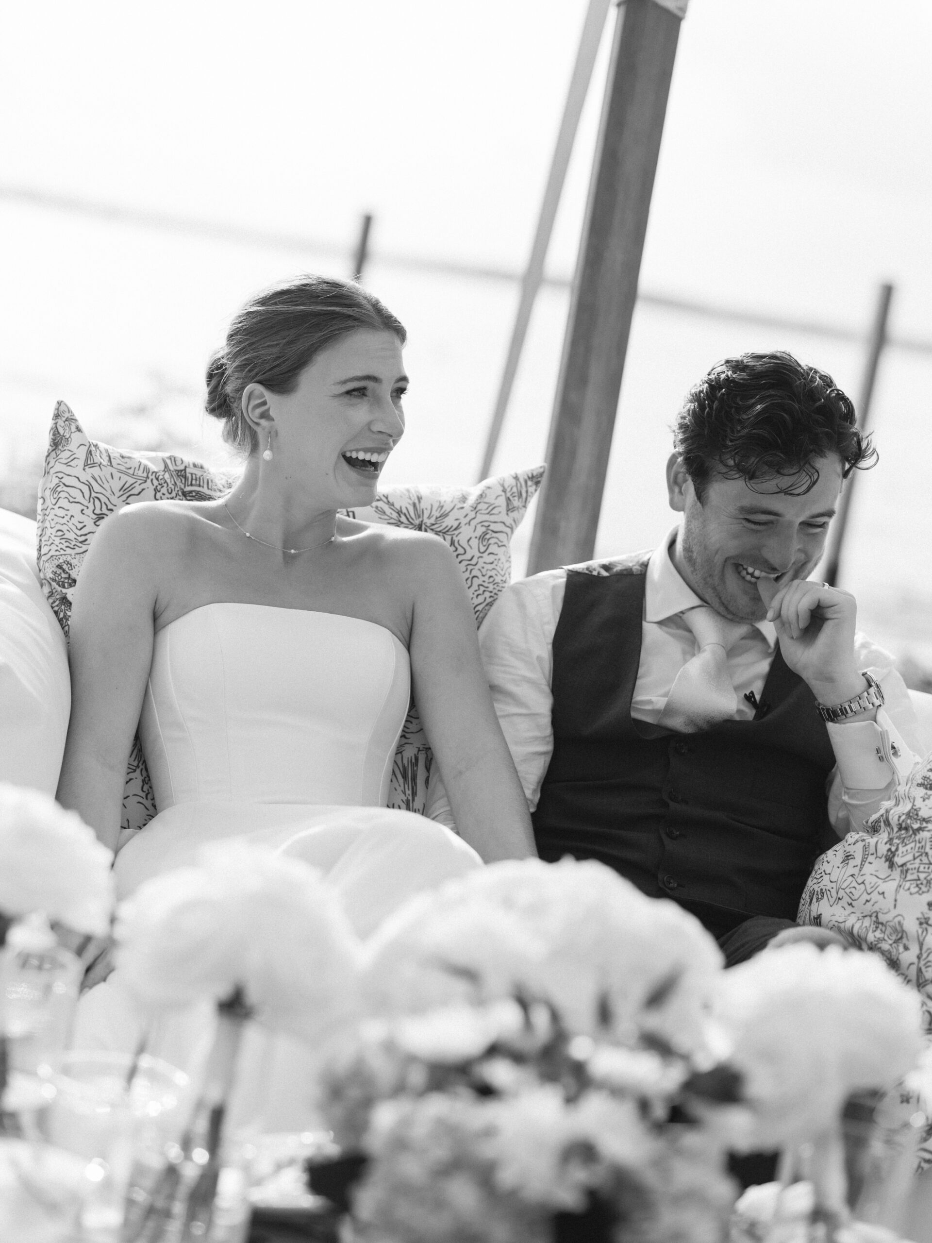 bride and groom laughing at wedding at minnetonka yacht club