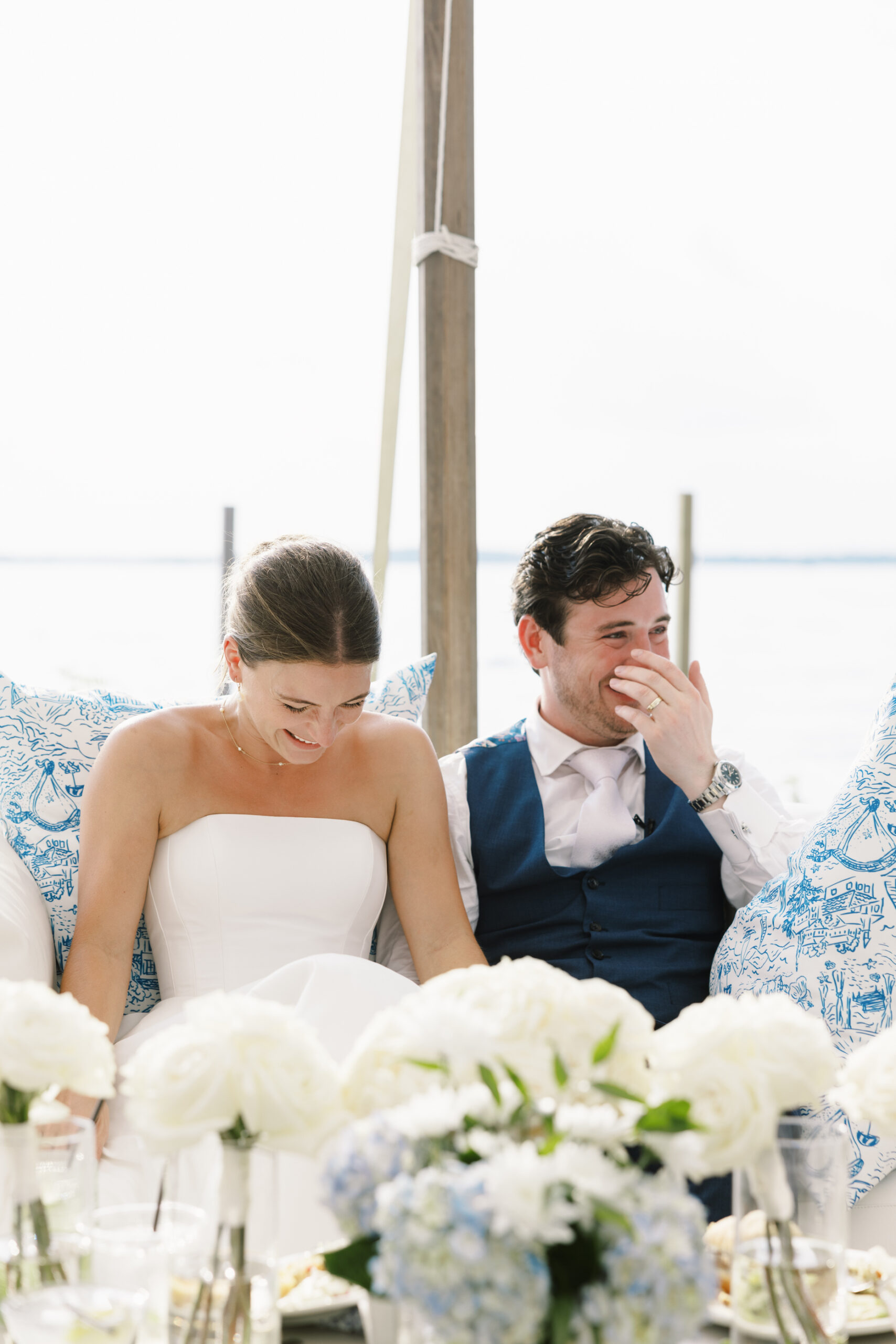 bride and groom laughing at minnetonka yacht club wedding