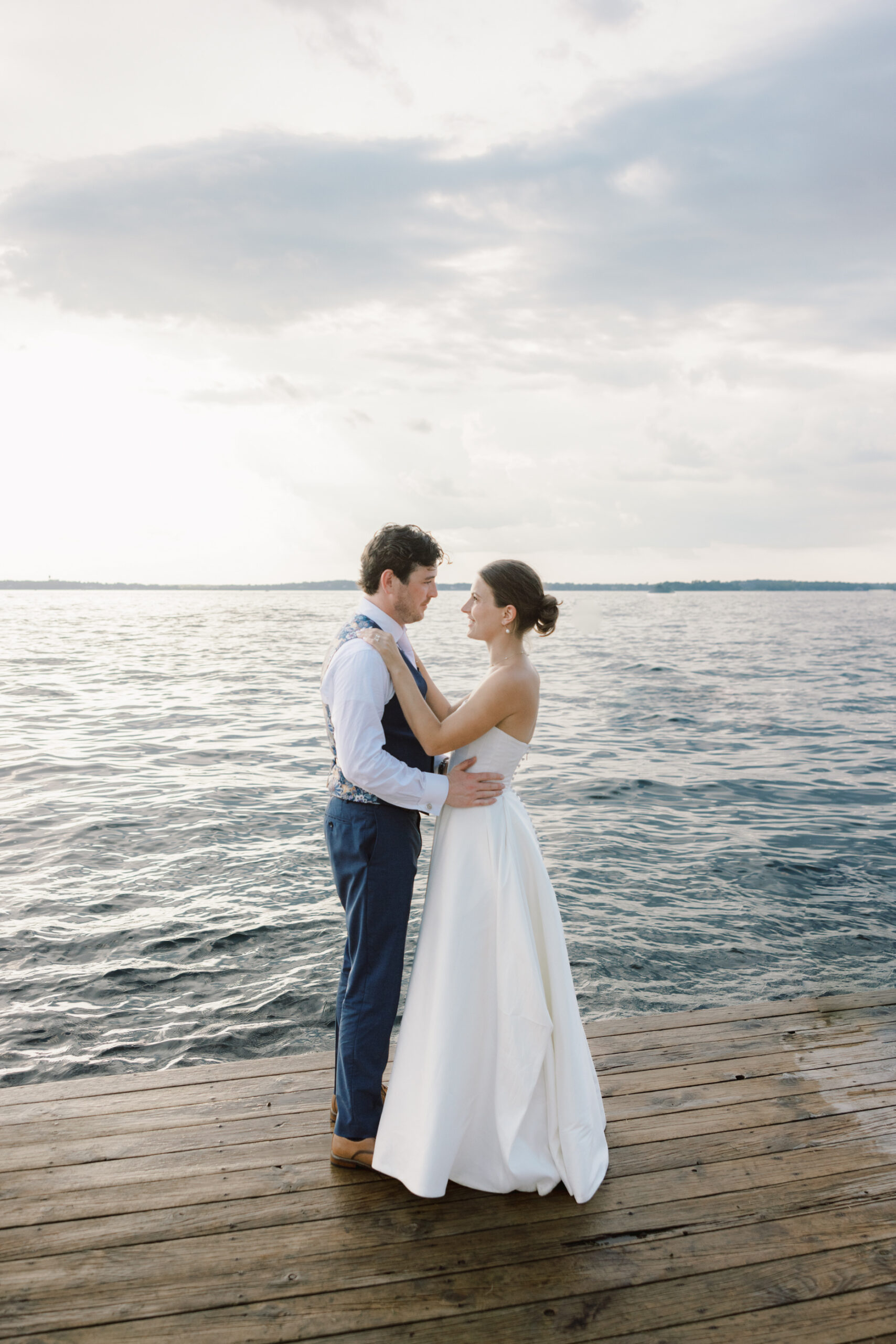 bridal portraits on dock at lake minnetonka yacht club
