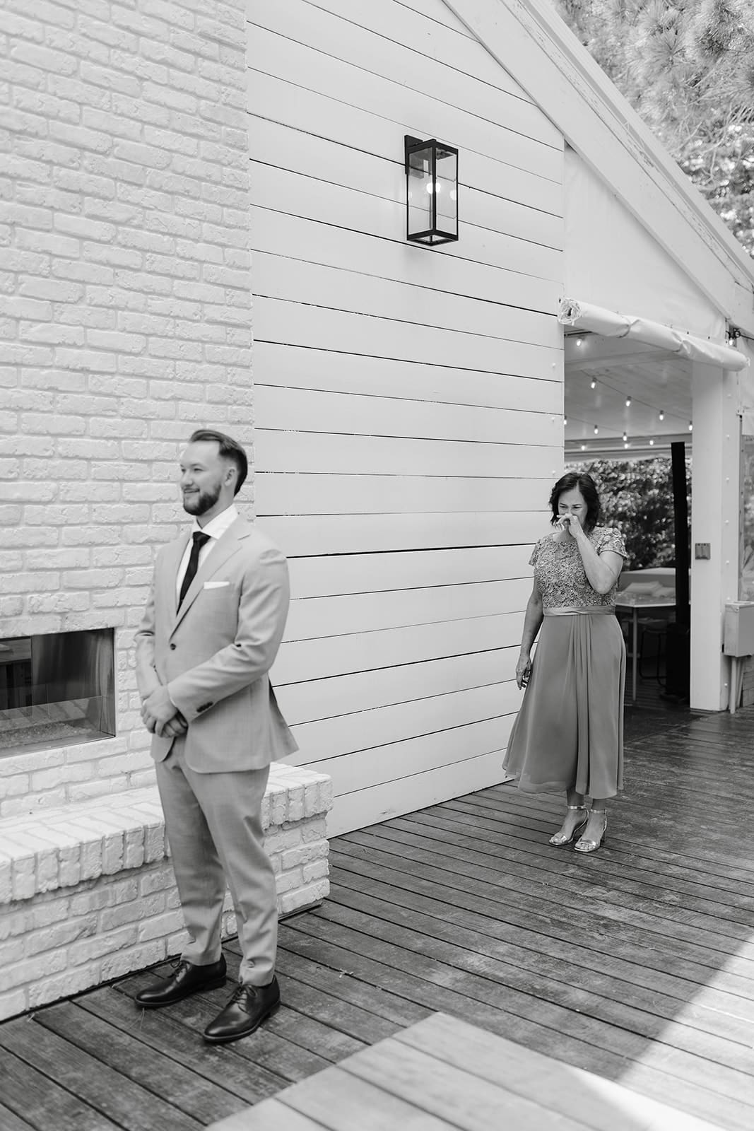 Groom waiting to see his mom on wedding morning at ivory north wedding venue.