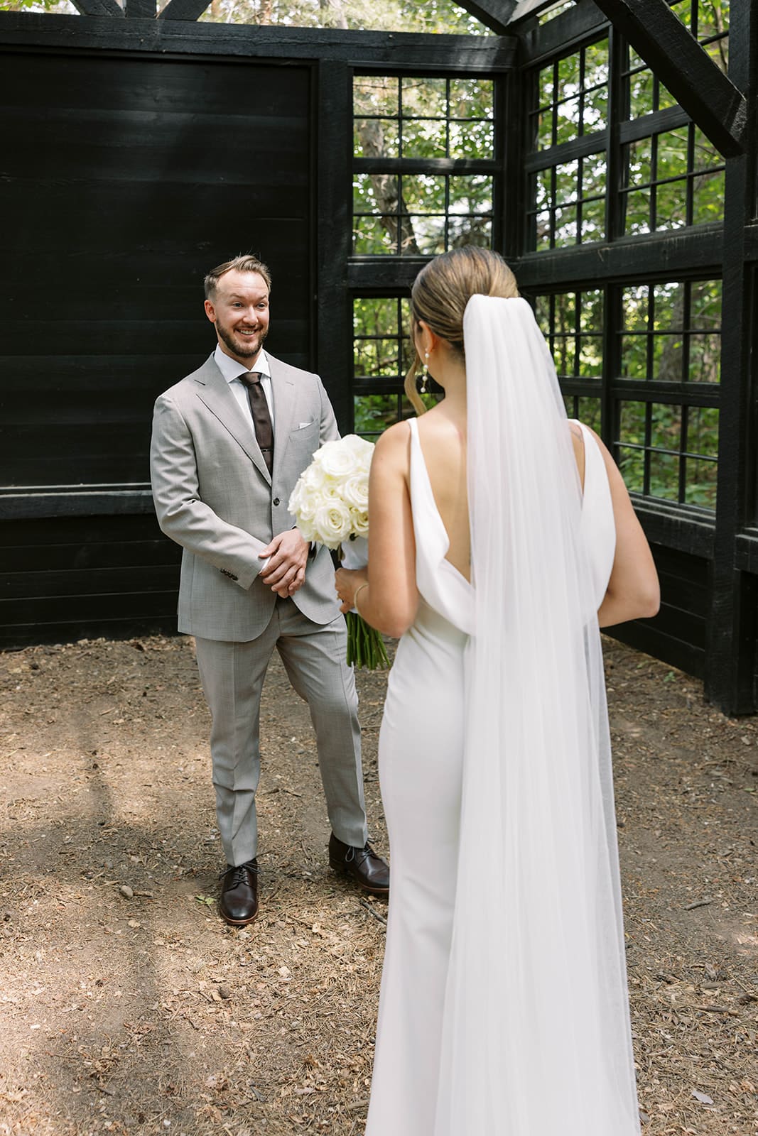 Bride and groom first look portraits at ivory north wedding in Mora, MN, photographed by Tom Thornton. 