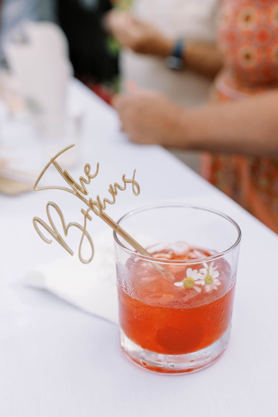 Photo of a Bride and groom signature cocktail photo at an Ivory North wedding reception. 