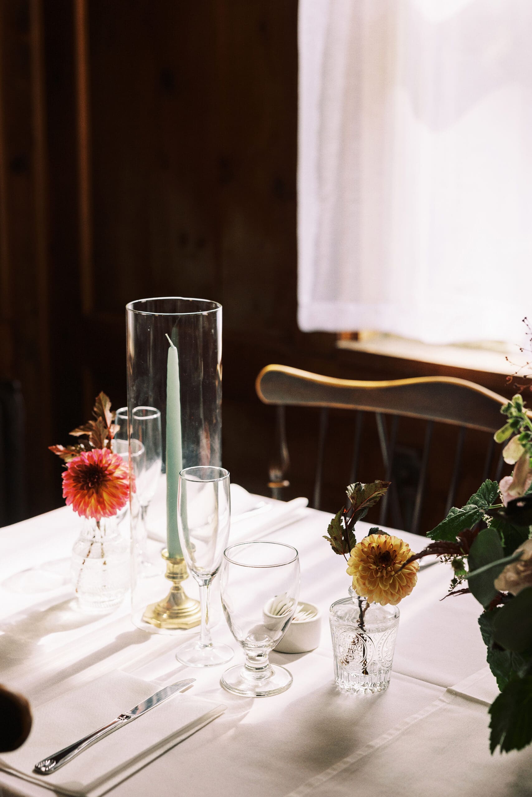 Close up photo of Cozy and warm wedding reception details at the Outing Lodge wedding in Stillwater, MN.