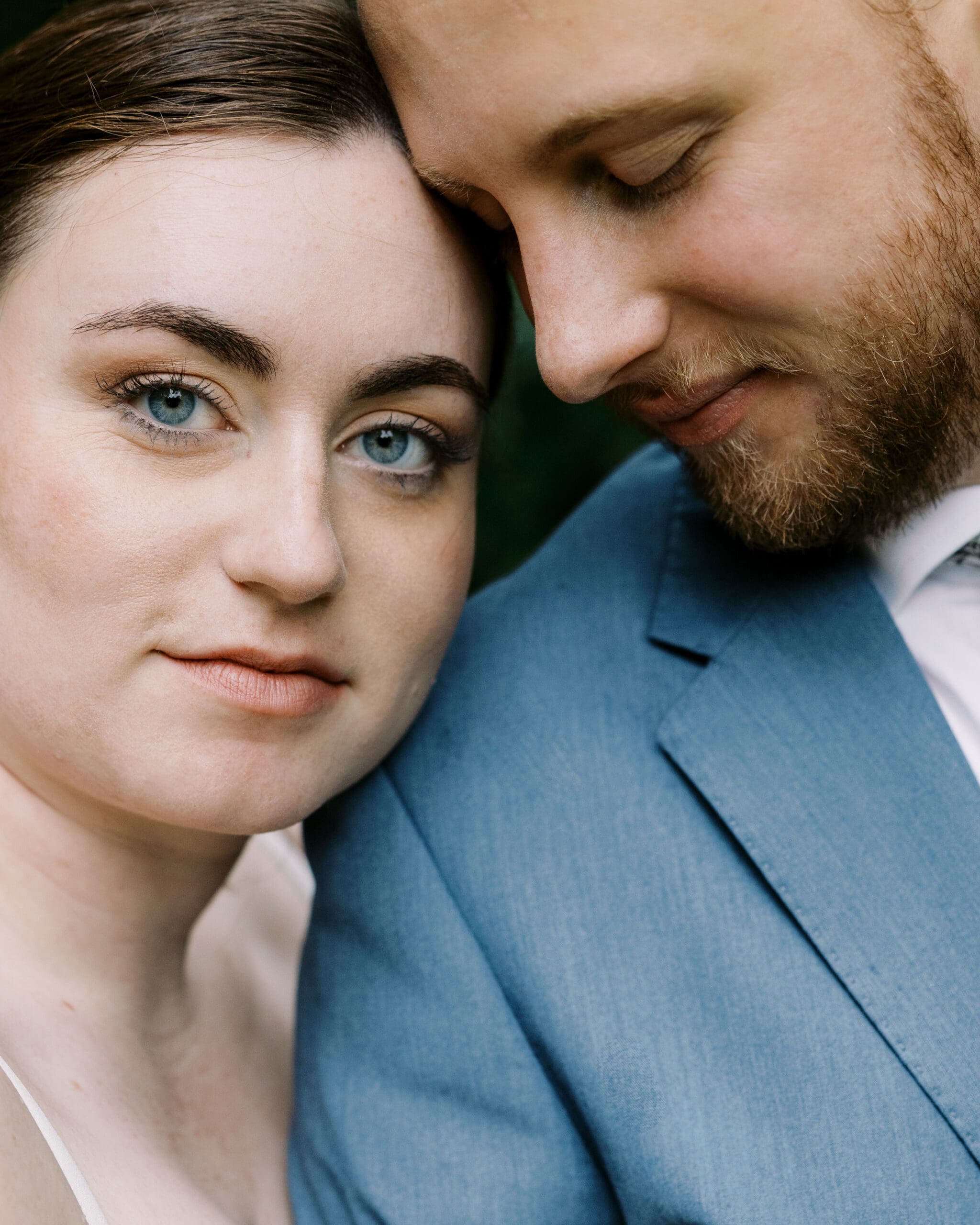 Bride and groom portraits at golden hour at their Outing lodge wedding in Stillwater, Minnesota. 
