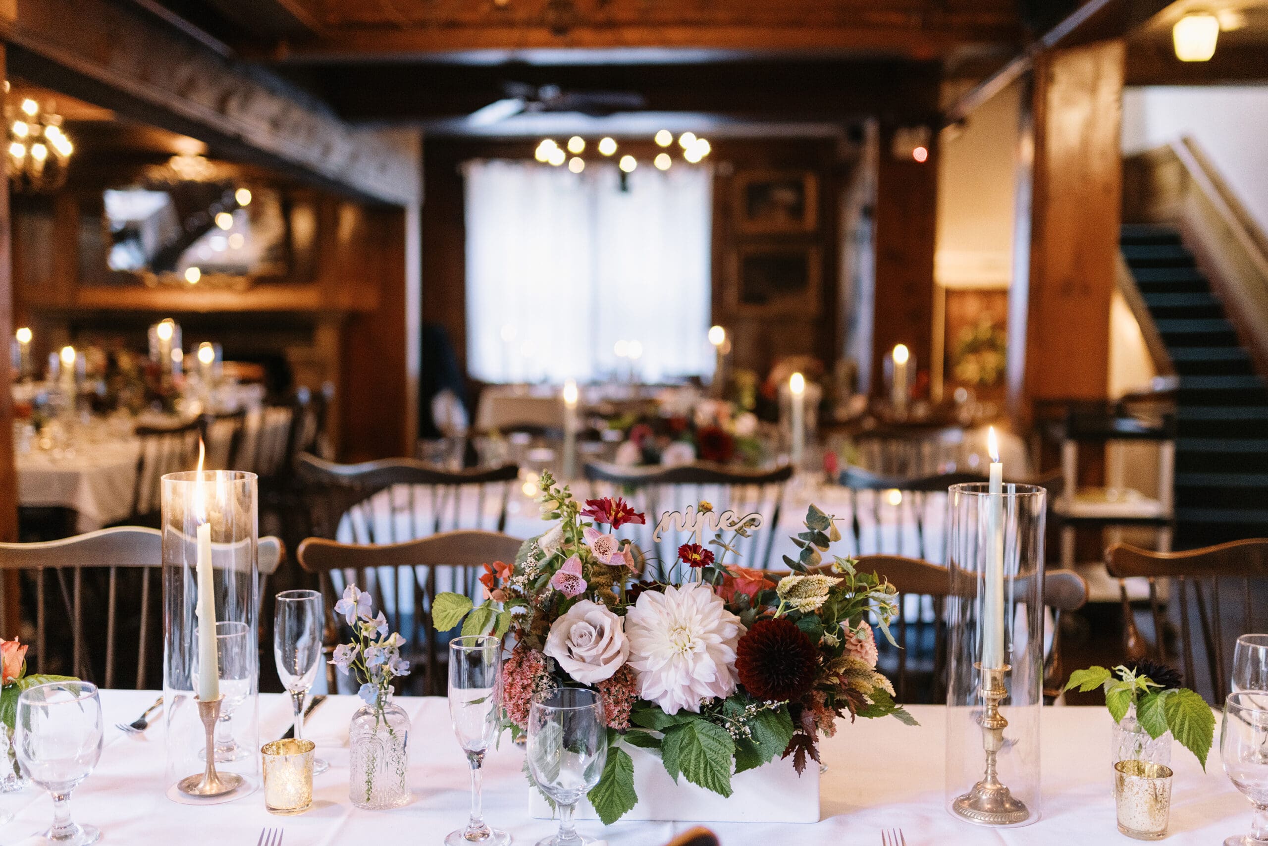 Cozy and warm wedding reception details at the Outing Lodge wedding in Stillwater, MN.