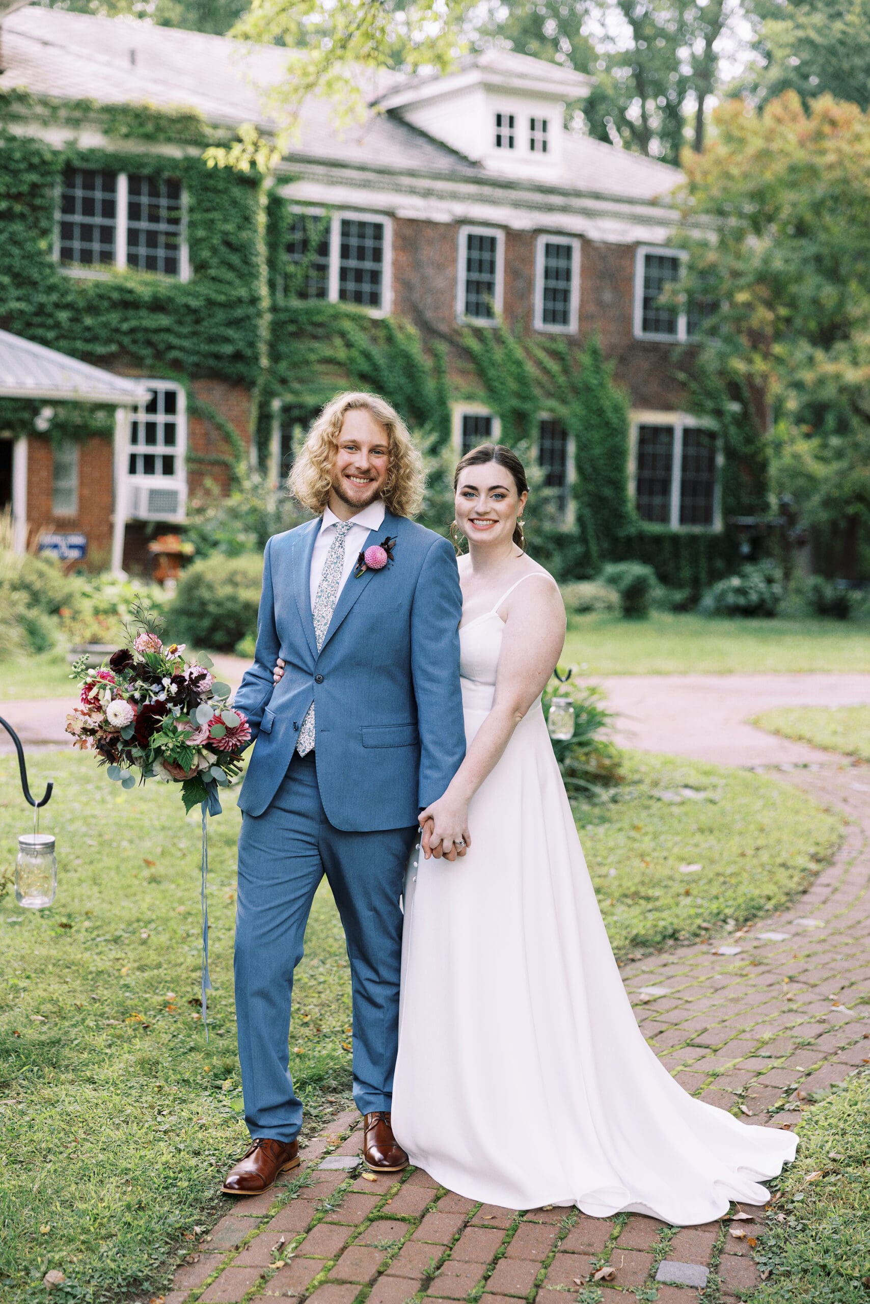 Bridal wedding portraits outside on the front lawn of the Outing Lodge in Stillwater, MN. 