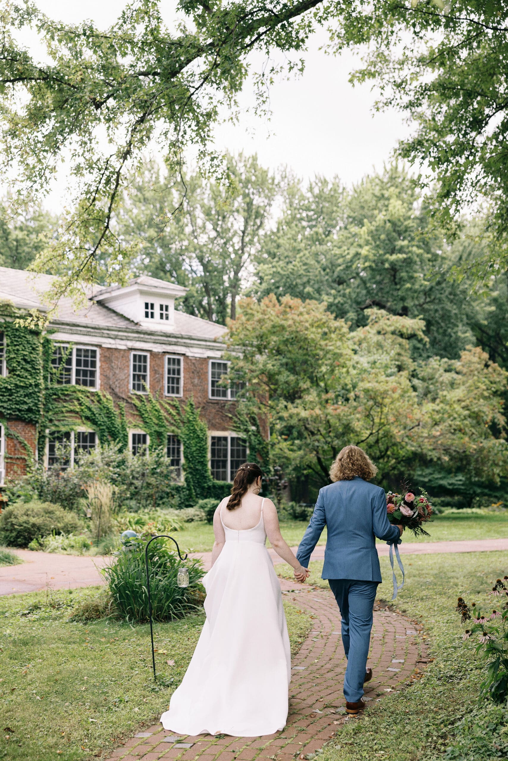 Bridal wedding portraits outside on the front lawn of the Outing Lodge in Stillwater, MN. 